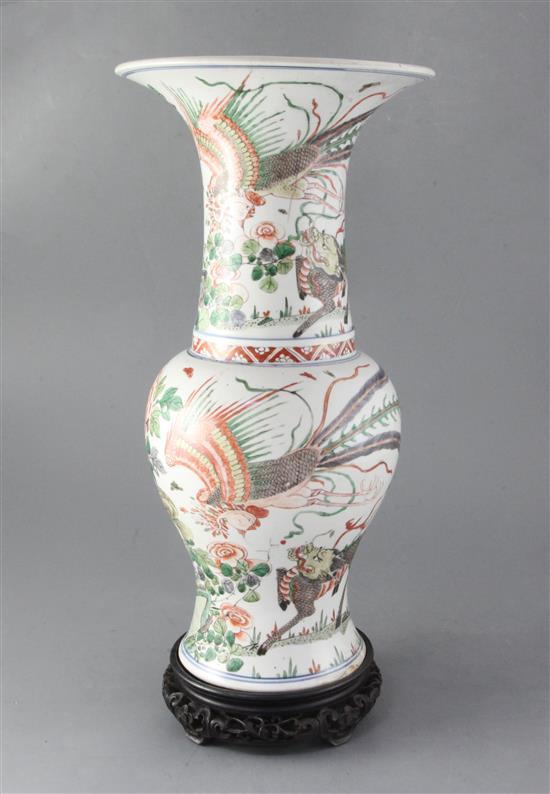 A Chinese famille verte baluster vase, Kangxi period 45cm high, wood stand, some faults